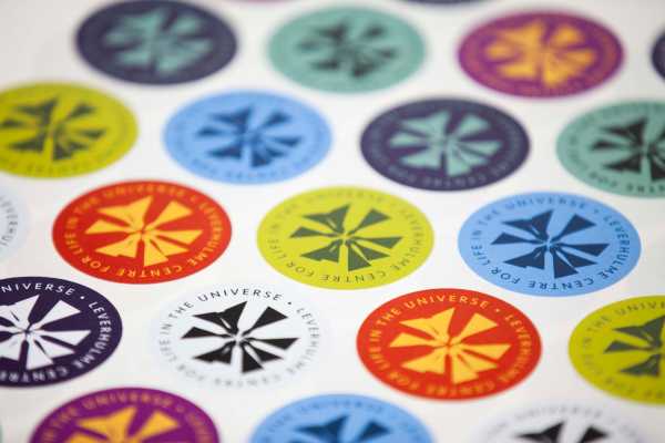 Stickers with the Leverhulme Centre for Life in the Universe logo.